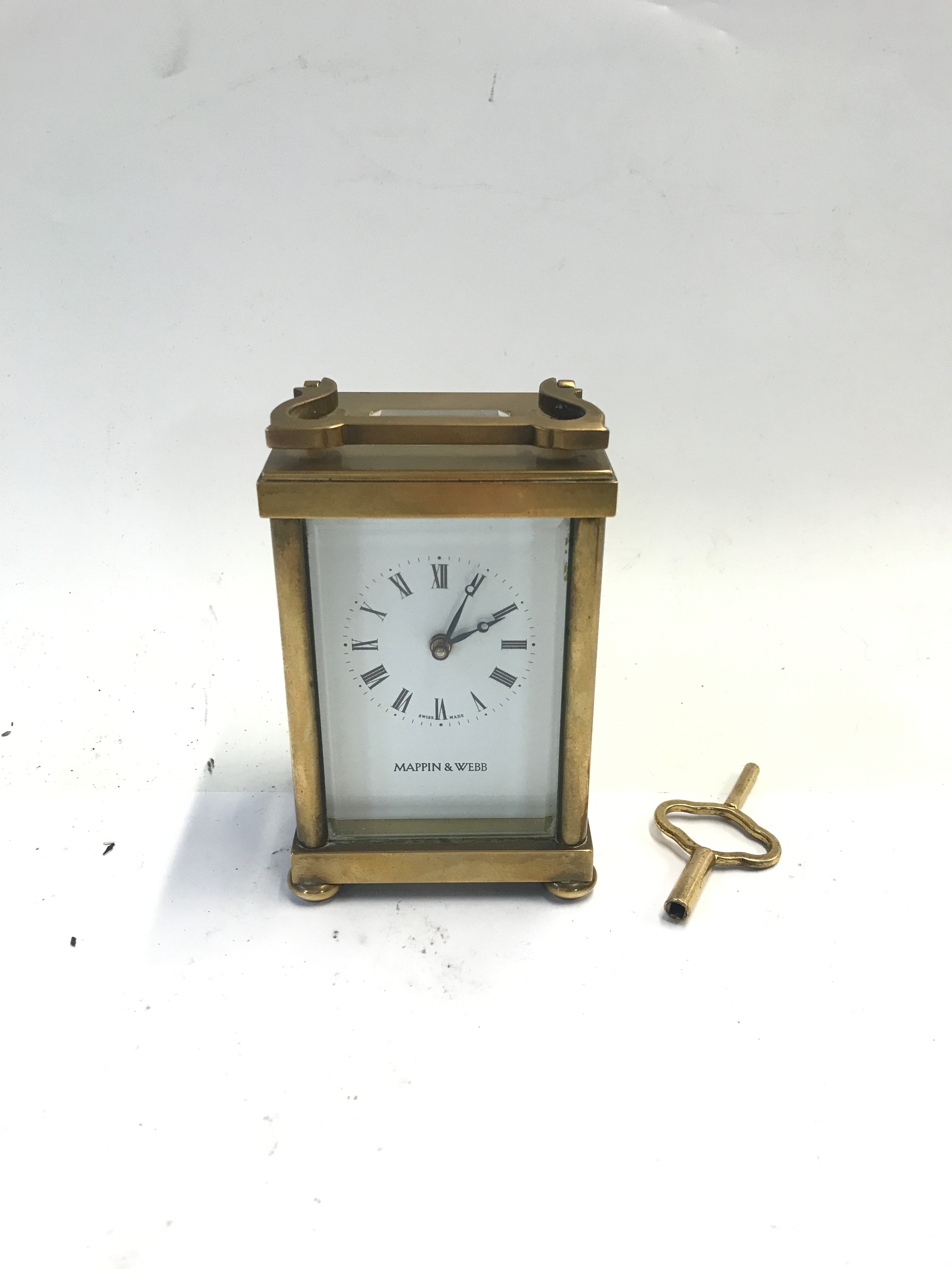 A Mappin and Webb gold plated carriage clock
