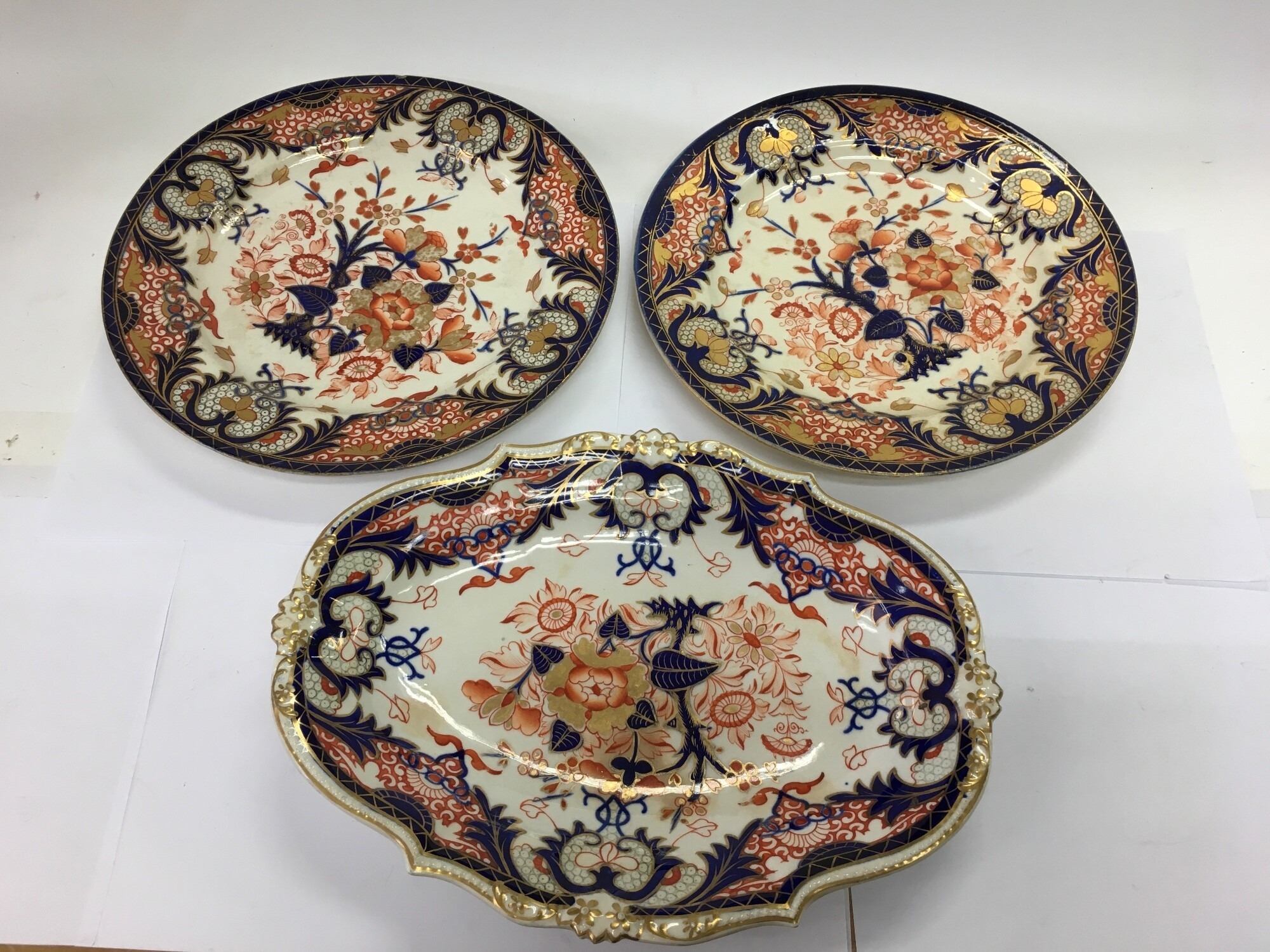 Three Royal Derby porcelain plates, one with a shaped edge, diameters approx 29.5cm and 25cm. NO RESERVE