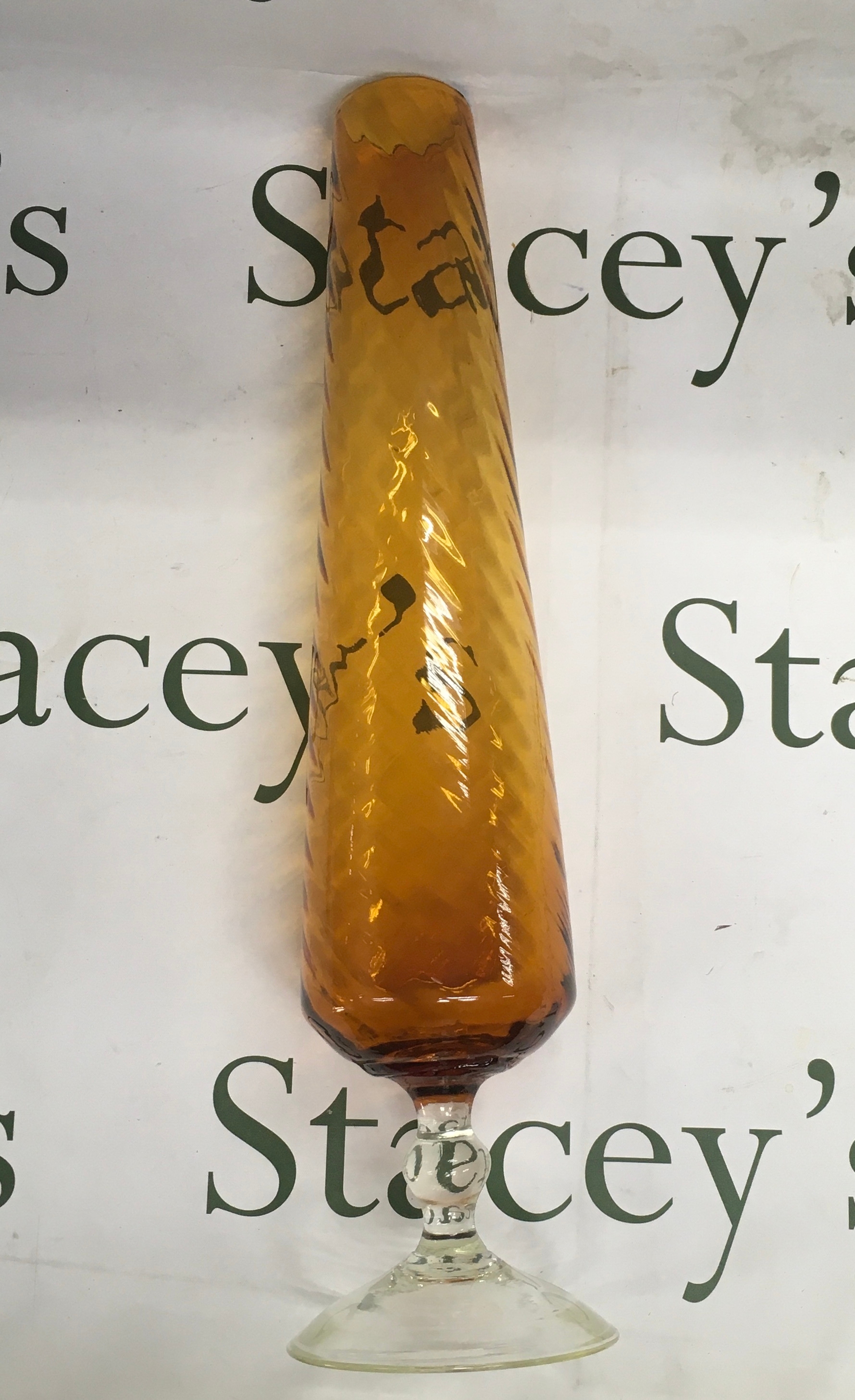 Tall amber twisted vase
