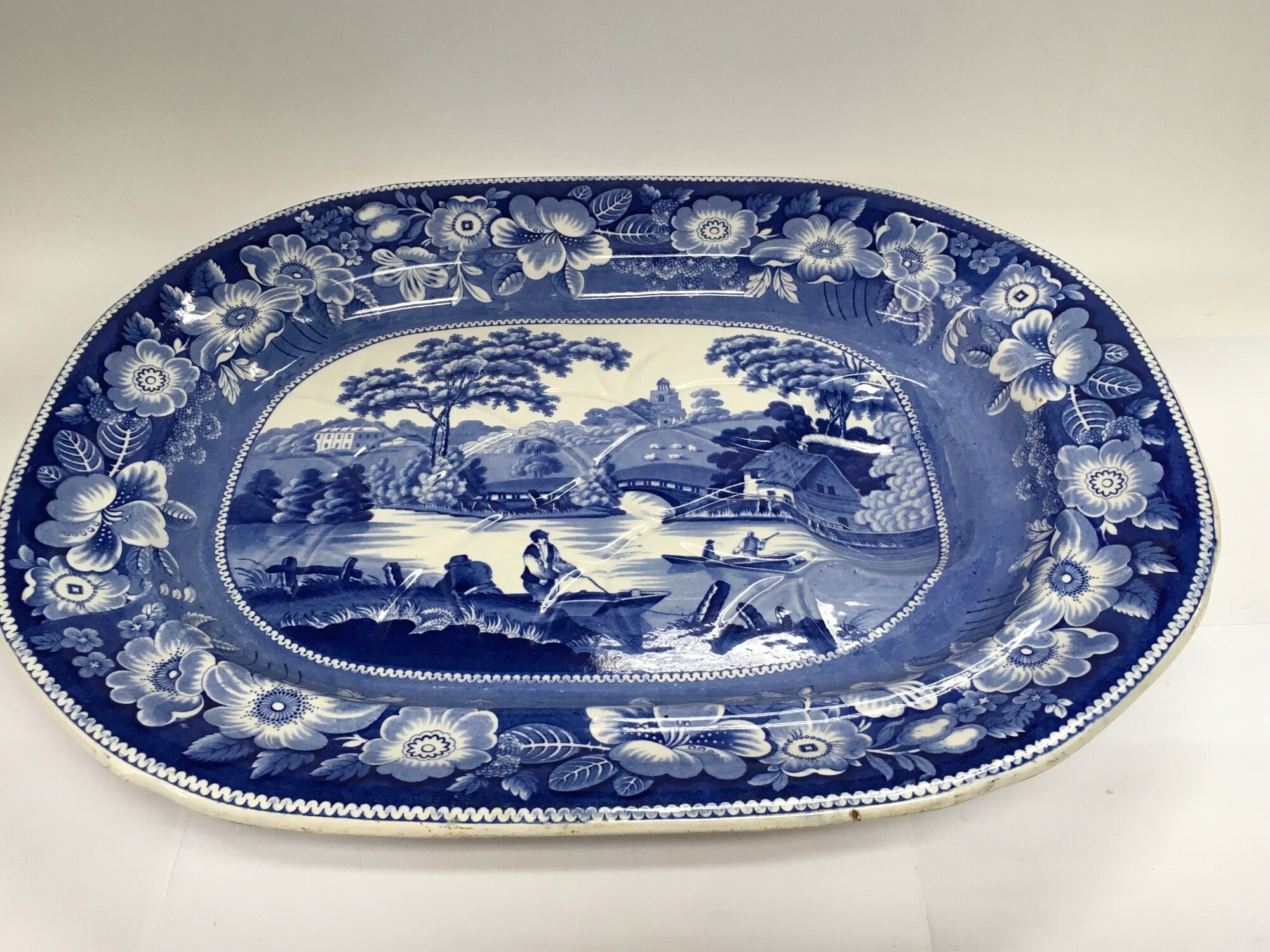 A blue and white meat plate depicting a pastoral countryside scene, approx width 53.5cm. NO RESERVE