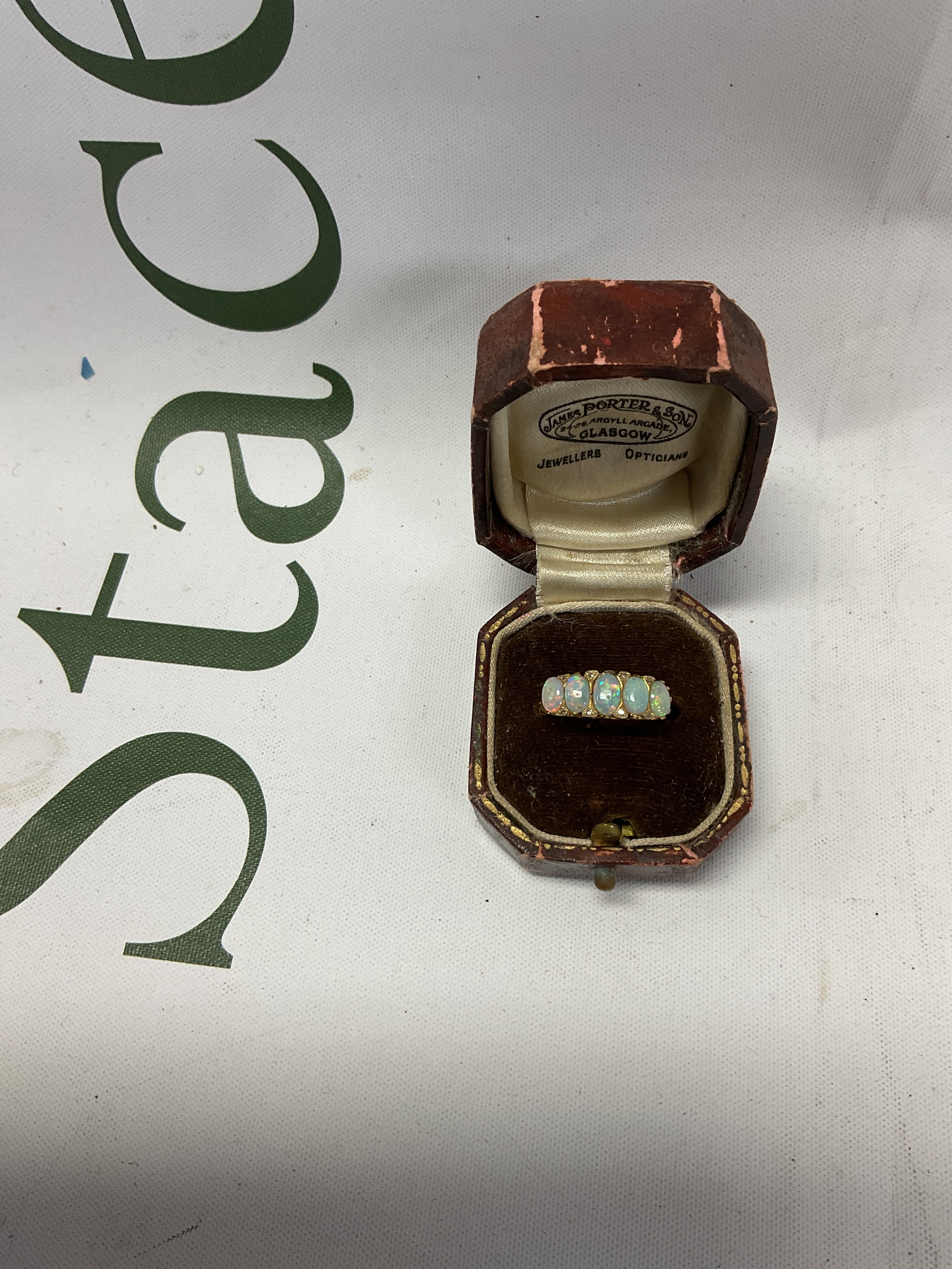 18 ct five stone Opal ring, weight 3.7 grams.