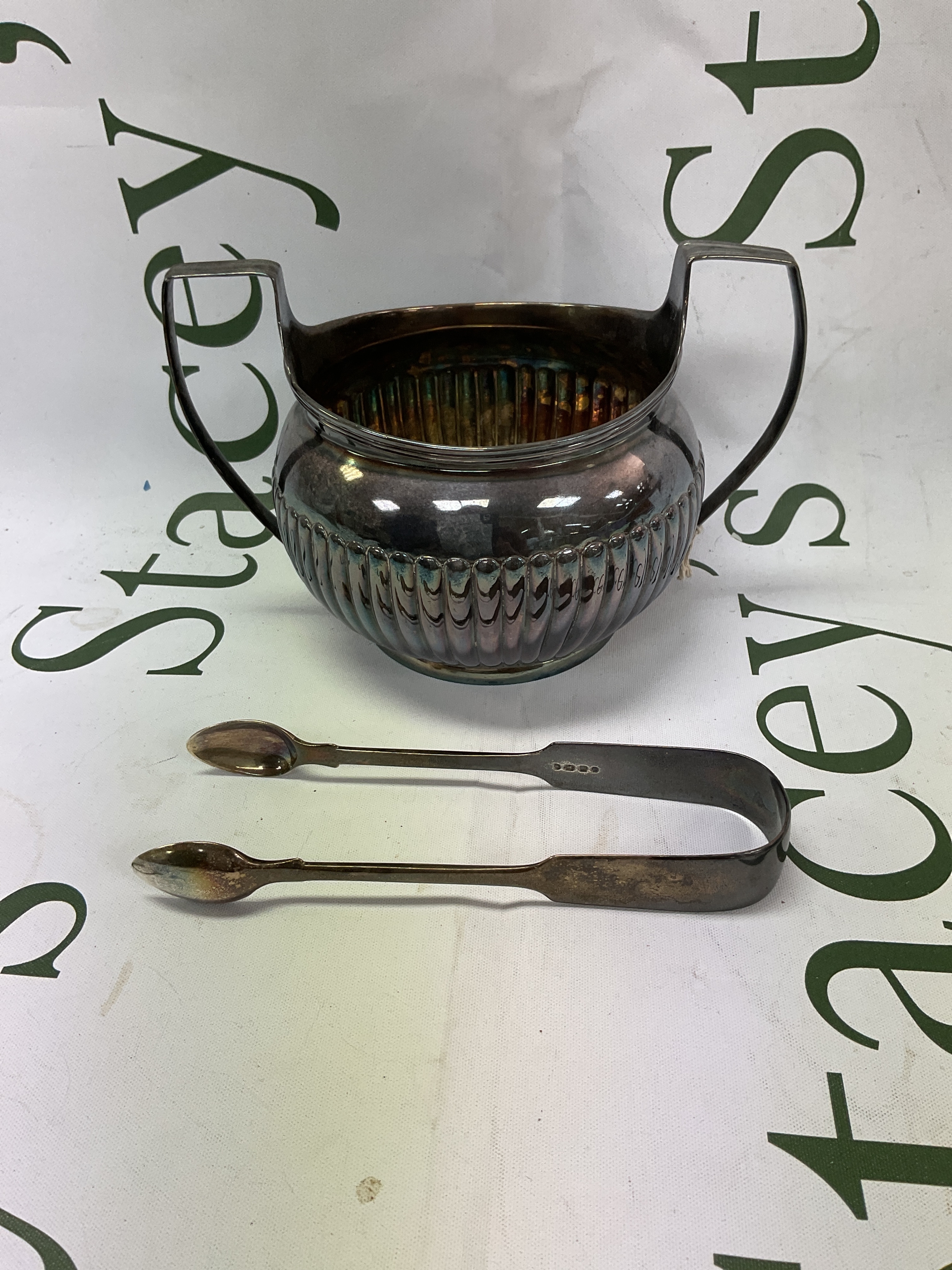 Georgian silver twin handled Sucrier 1801 London by Robert and David Hennell, along with a pair of silver sugar snips 1853 London Maker, Weight 330 grams.