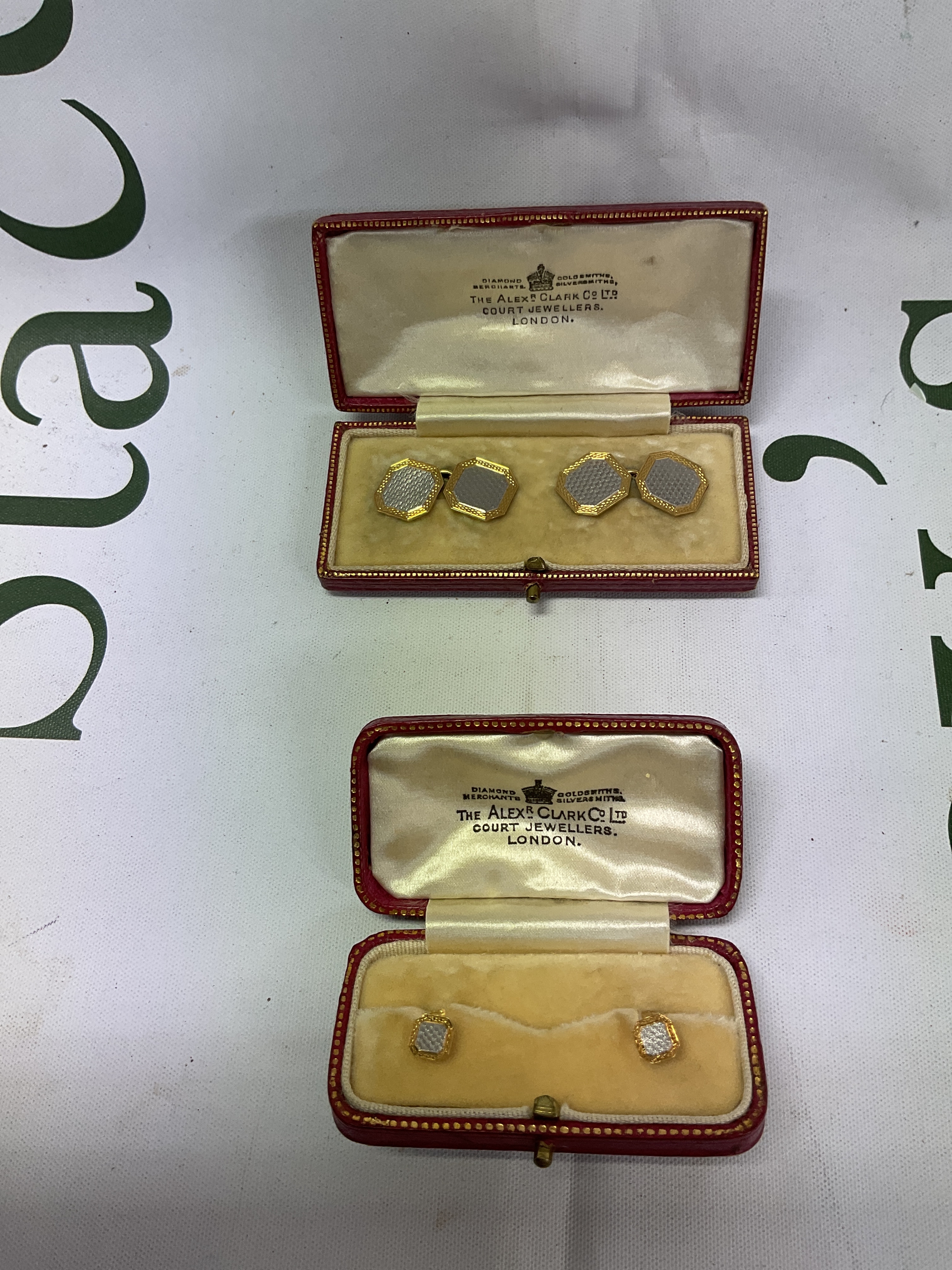 Cased vintage Alexander Clark &Co Ltd cufflinks and stud set in 18 ct and Platinum. Weight 10.3 grams.