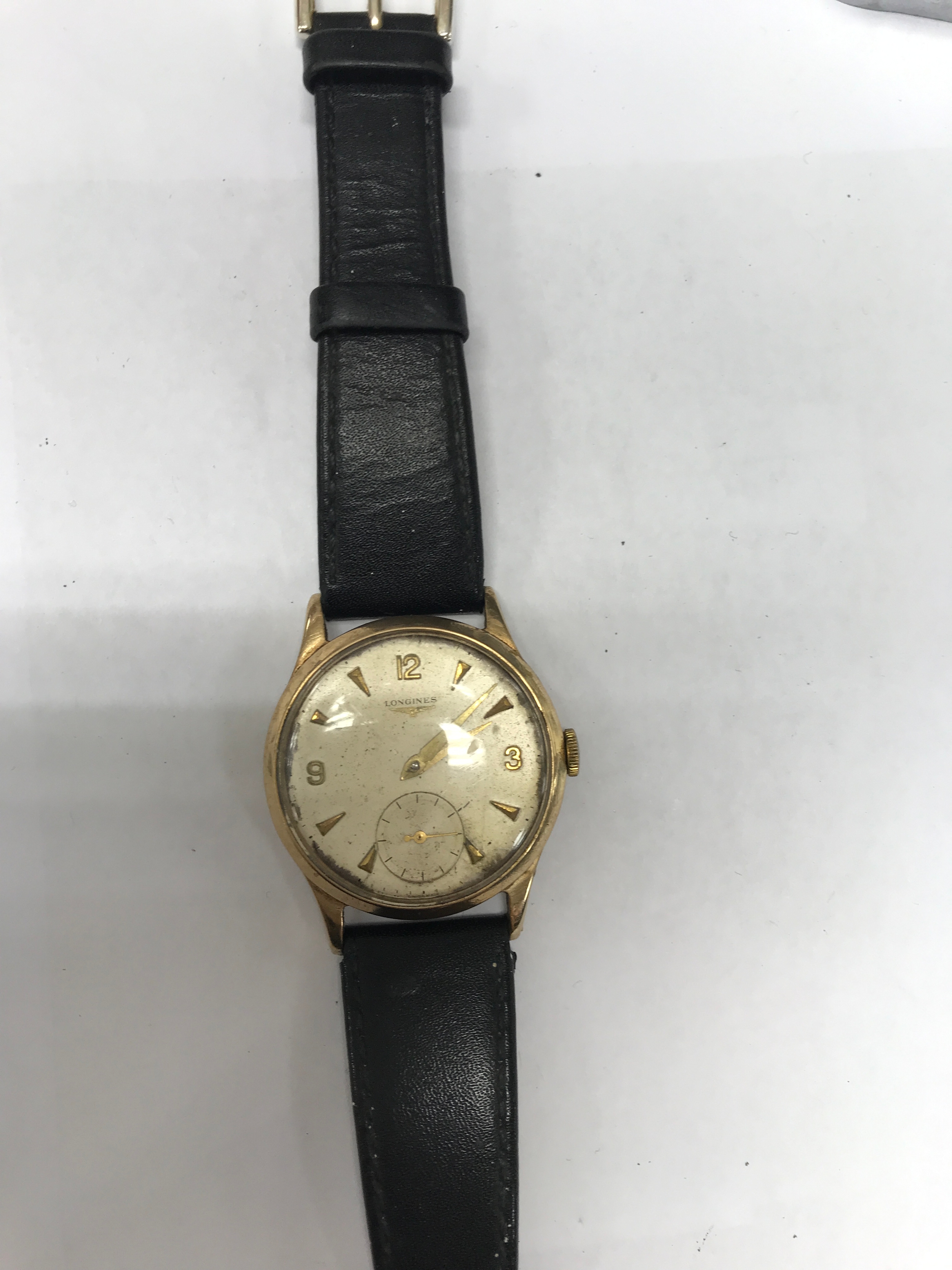 A 9ct gold Longines wrist watch