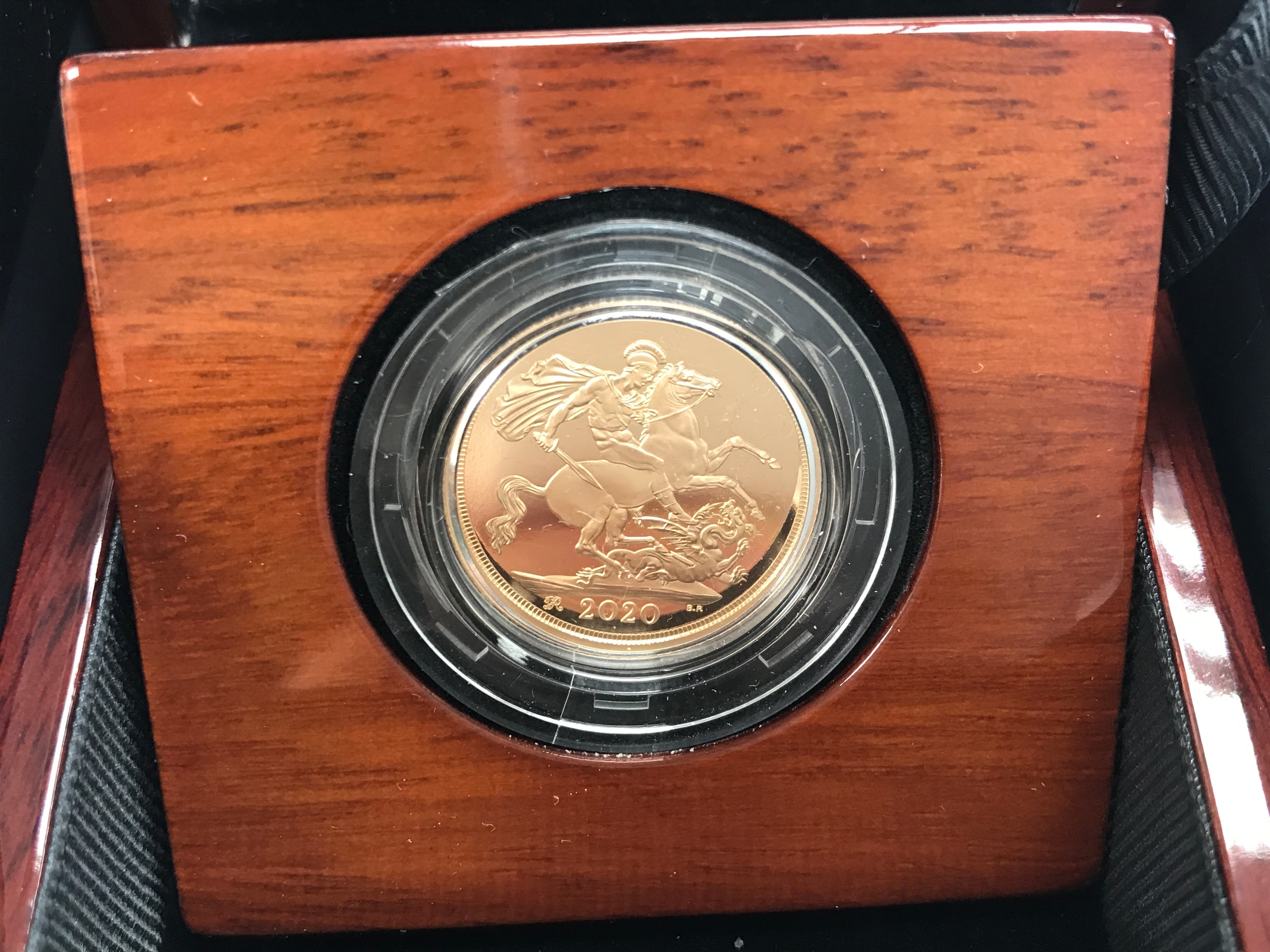 A 2020 gold proof sovereign.