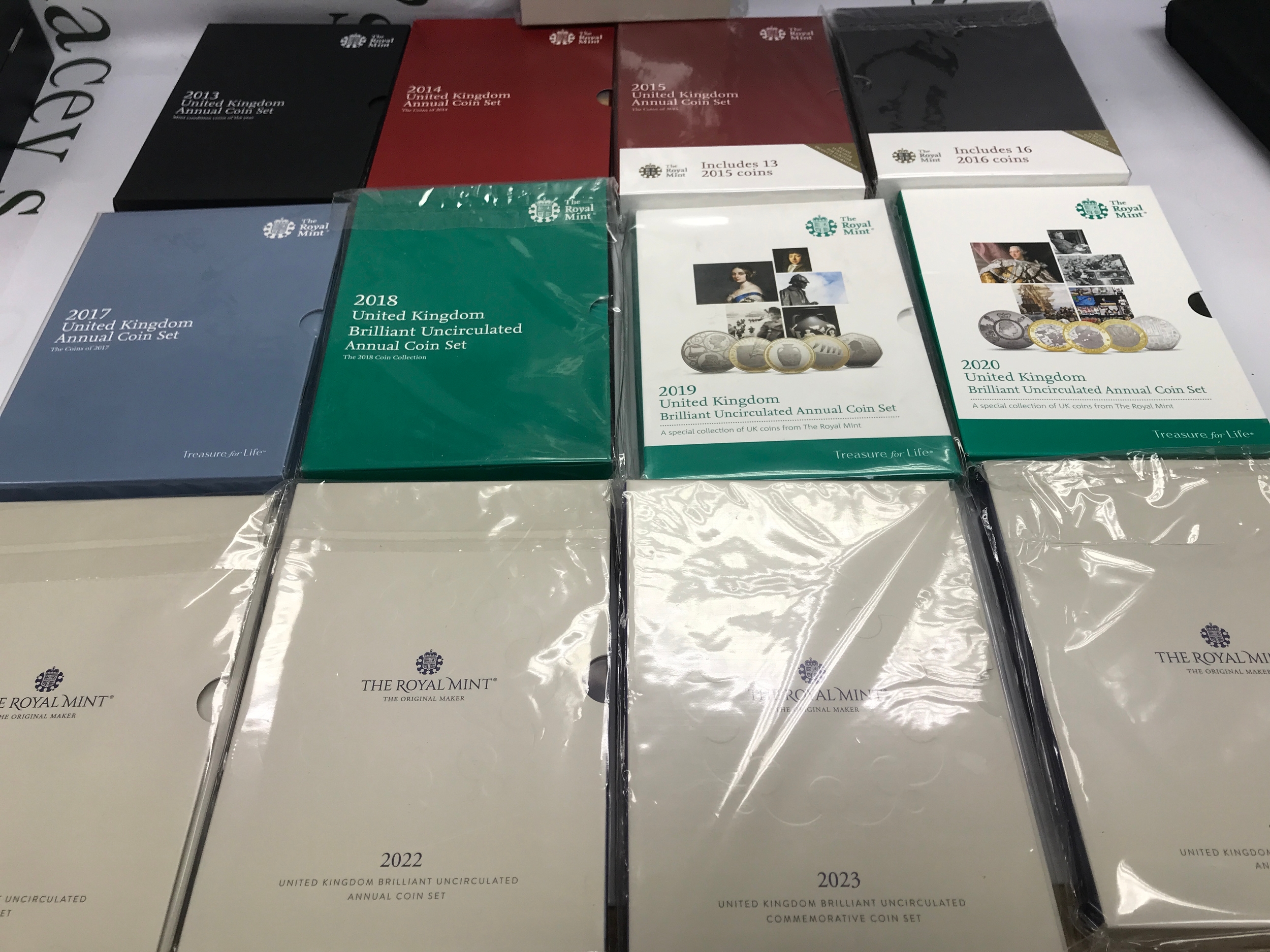 13 United Kingdom annual coin sets from 2013 - 2024 and 2026