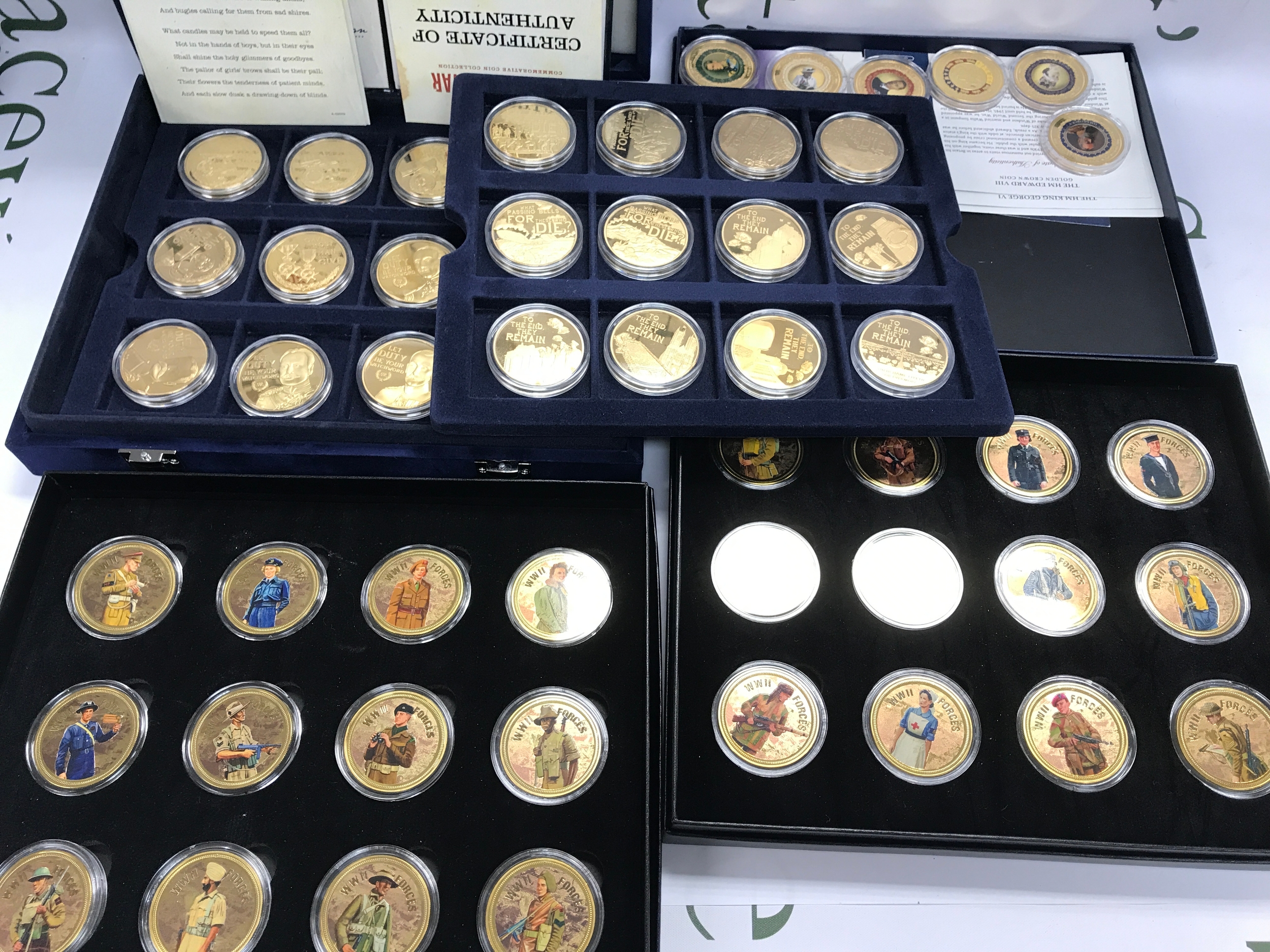 Collection of various gold plated coins predominantly commemorating World War II 