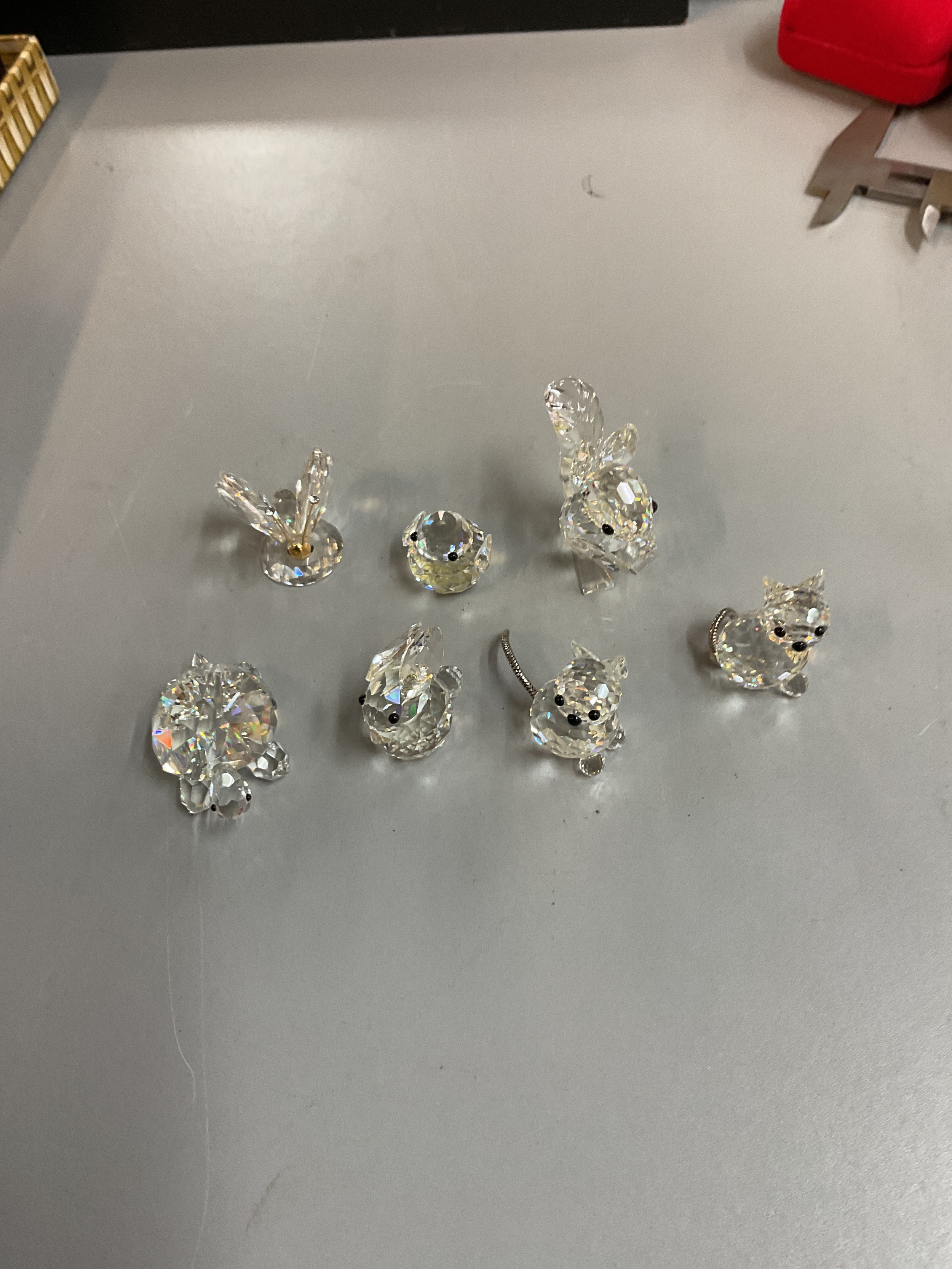 Qty of Swarovski animals and some damaged unwrapped in box.