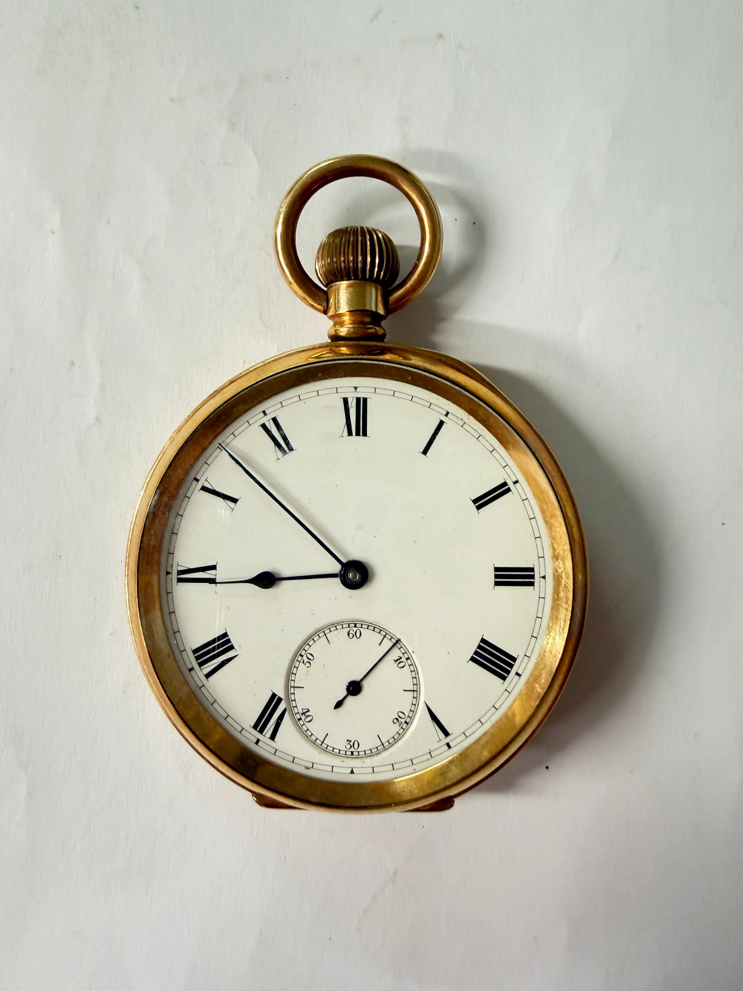 A gold plated pocket watch