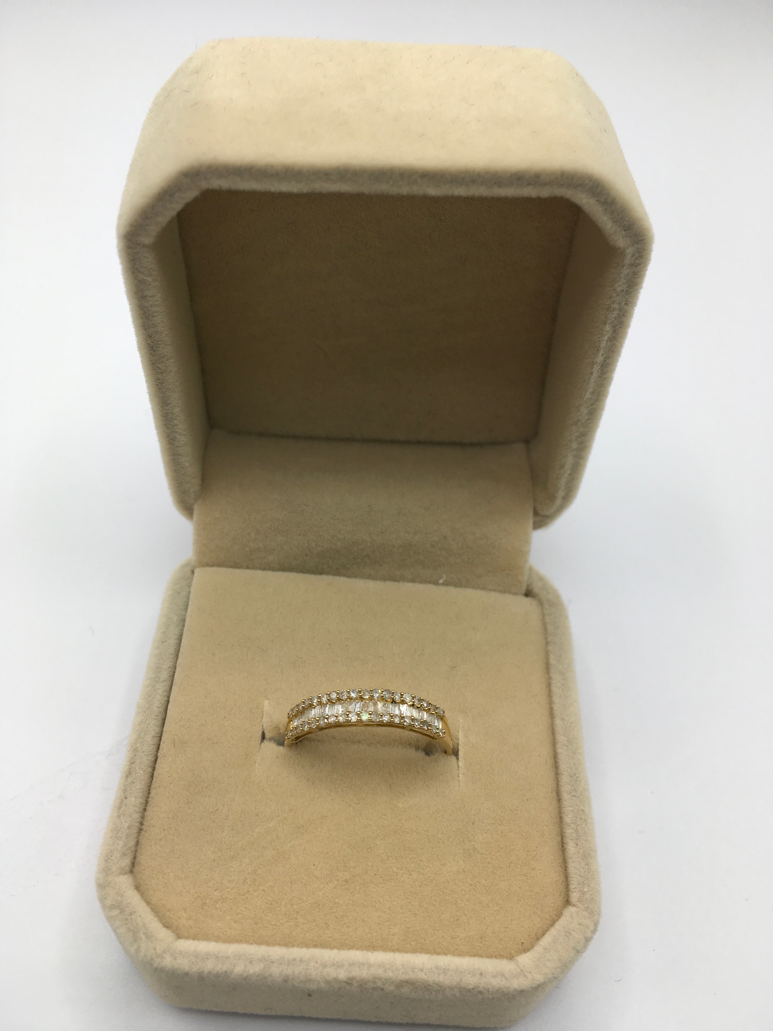 18k yellow gold ring set with natural, 0.30ct round baguette diamonds. Size 7.Boxed with cert.