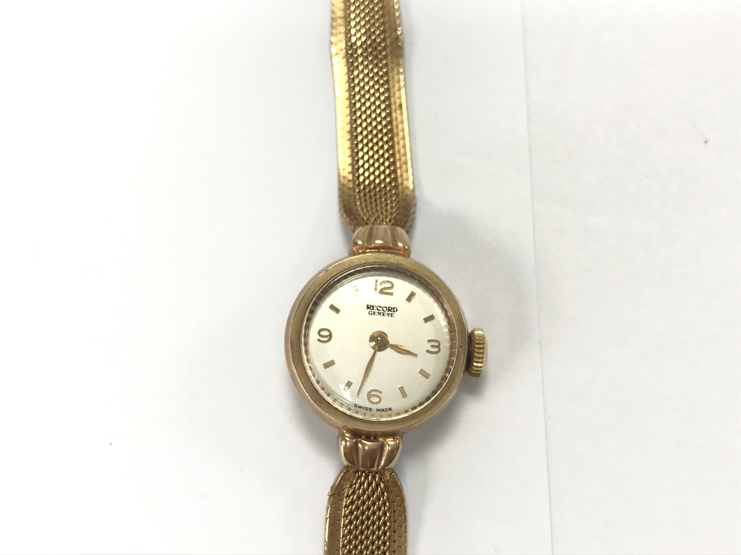 9ct Record Geneva watch round white dial and classic textured mesh gold bracelet. 14.2g