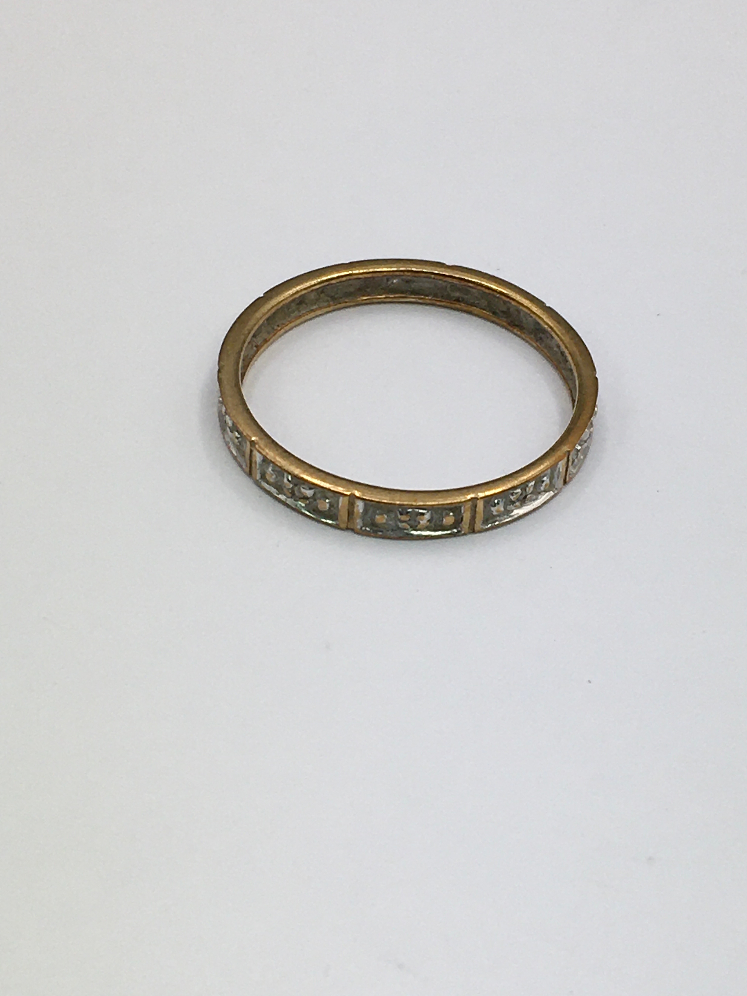 A 9ct gold eternity ring. Size P