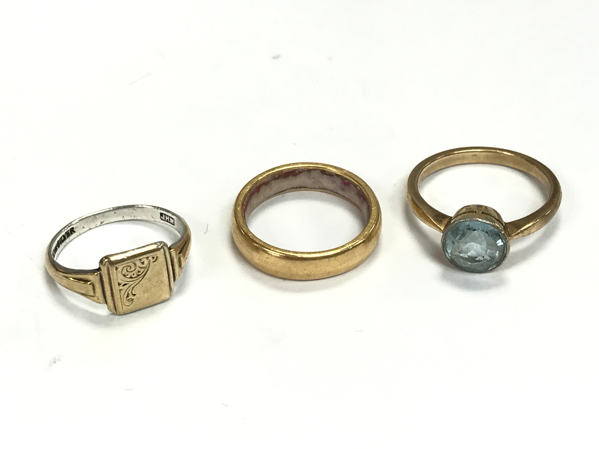 Three rings one marked 9ct and silver 