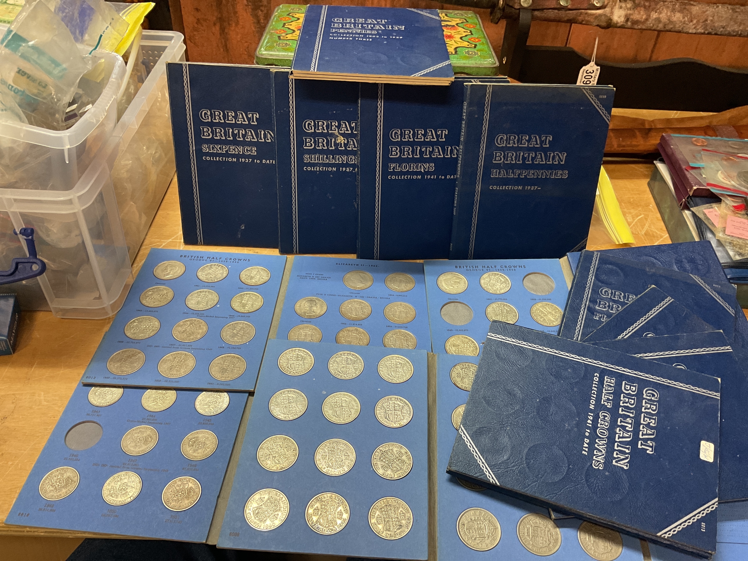 Qty Whitman folders lots of good grade pre 47 silver examples of half crowns and florins. 13 folders.
