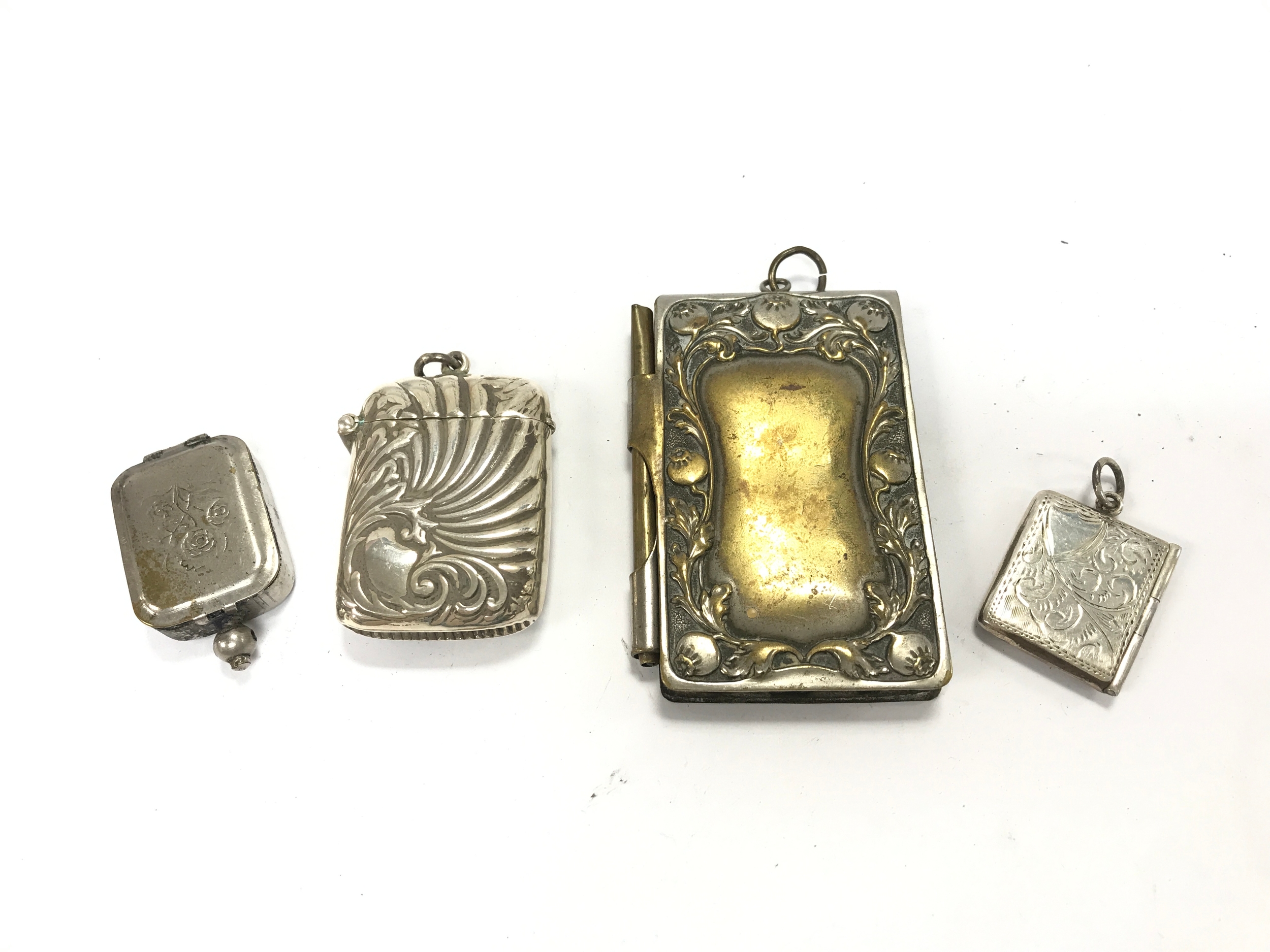 An engraved card case , a silver hallmarked stamp holder , stamp seal and case, silver hallmarked Vesta.
 