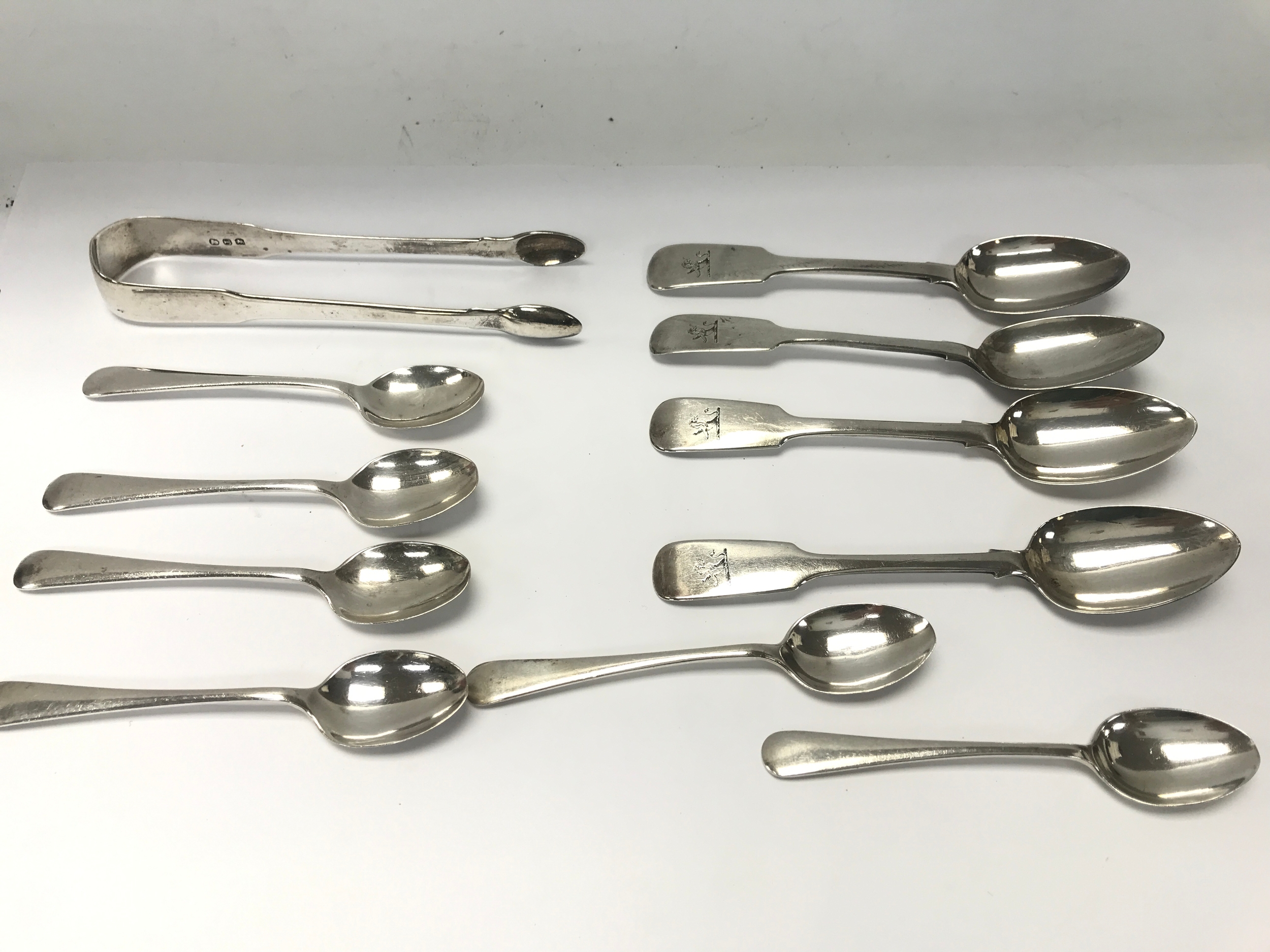 Collection of assorted silver spoons and tongs. approx 220g 