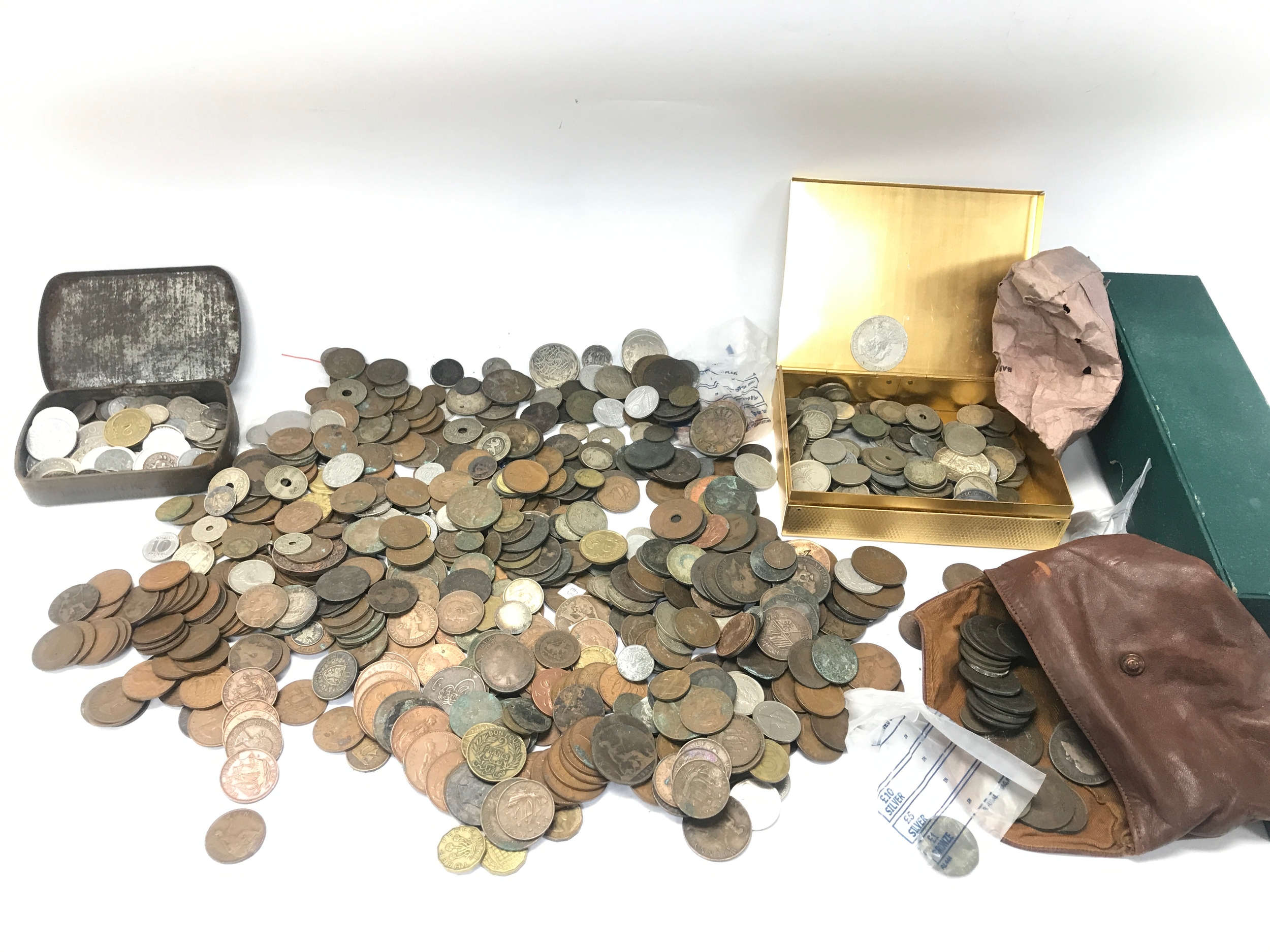 A large collection of assorted world coins.
