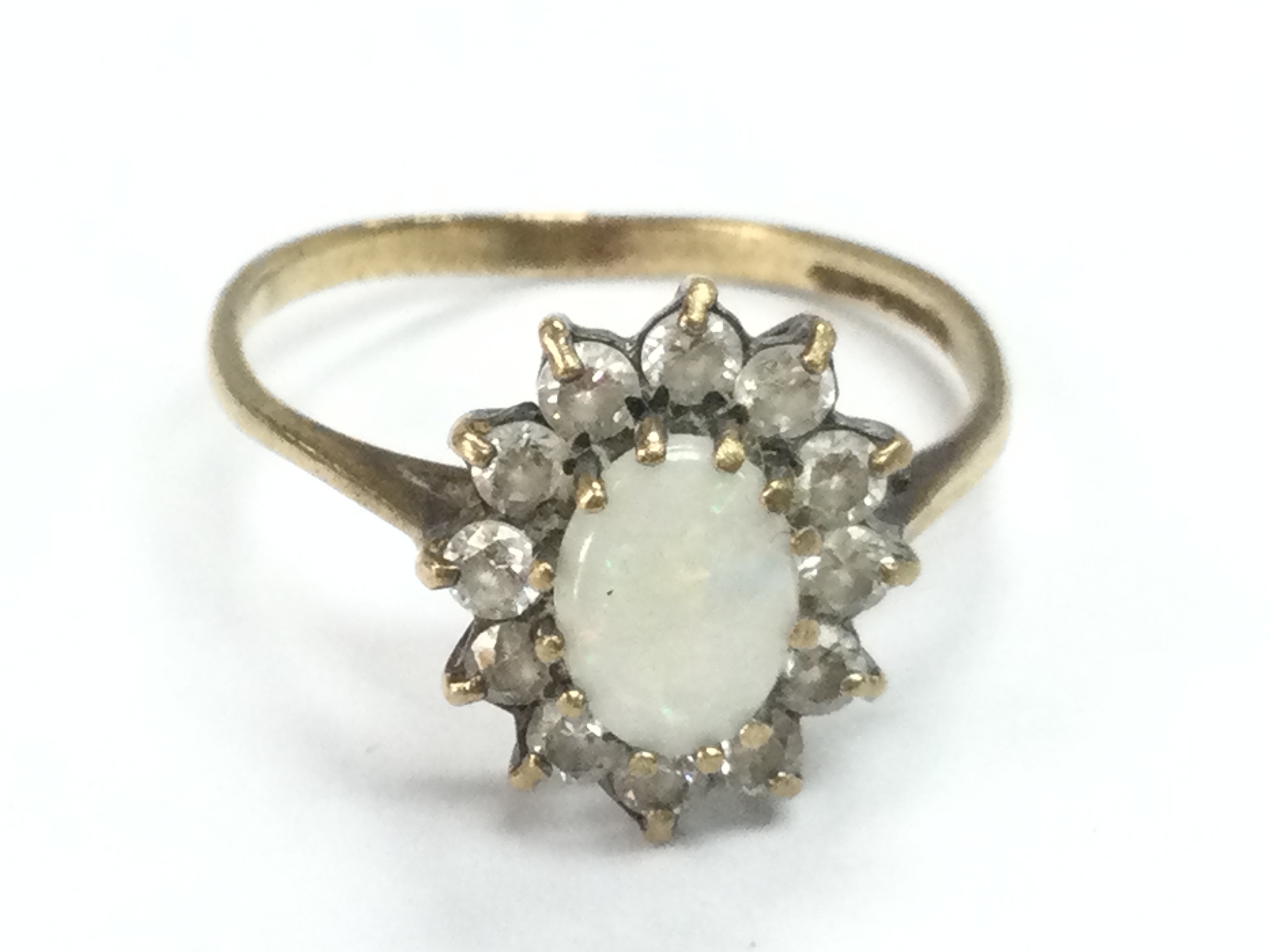 A 9ct gold opal solitaire ring. Size O/P 1.7g
