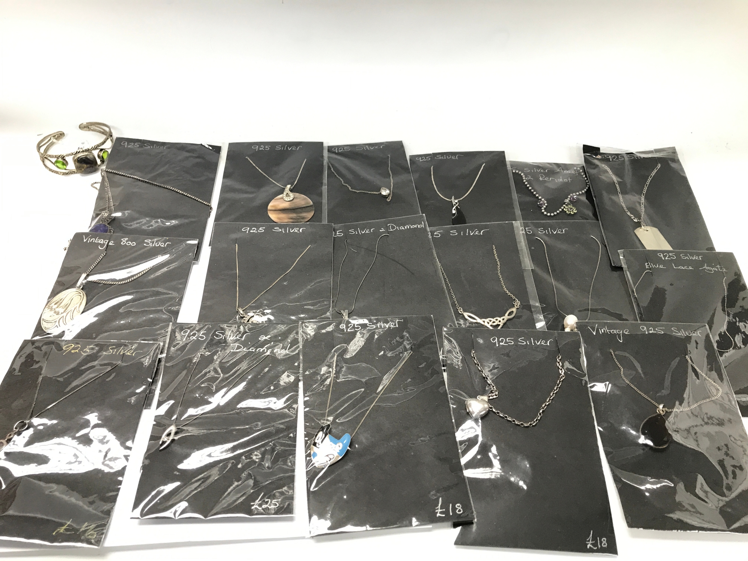 Collection of various silver jewellery items.