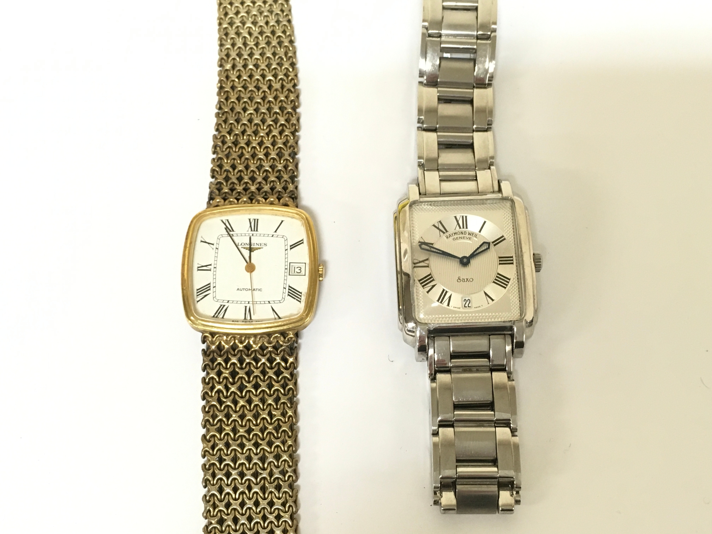 Two gents watches including a vintage Longines and a Raymond Weil.