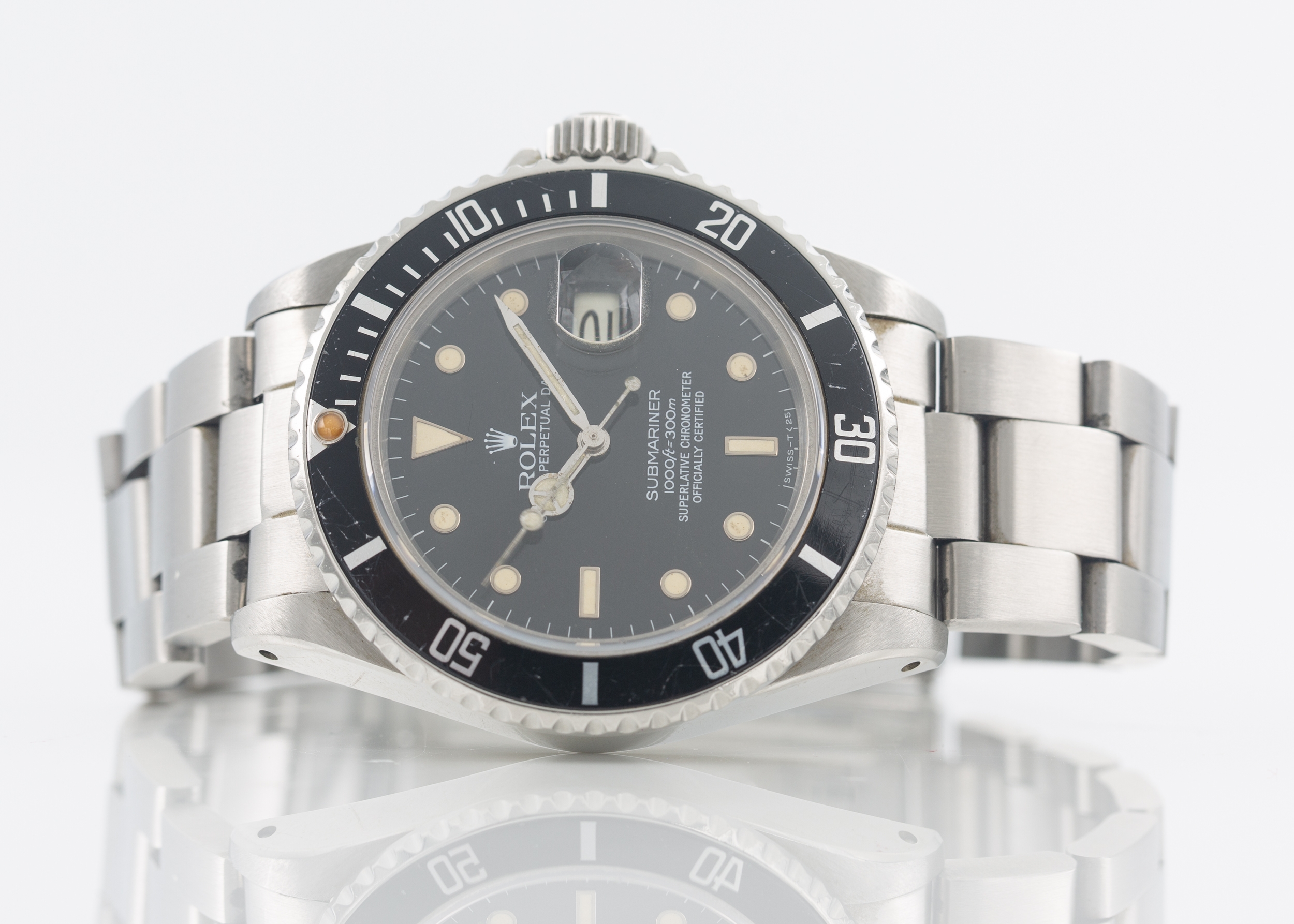 Rolex Submariner reference 16800 is a legendary transitional diver highly favoured by collectors. It perfectly bridges vintage aesthetics with modern durability. Watch showing nice age to hand and markers. Winds and runs. Comes with box and papers. Serial number dates it circa 1984.