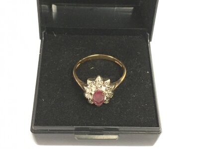 A 9ct gold ruby and diamond ring, approx 2.7g and approx size O.