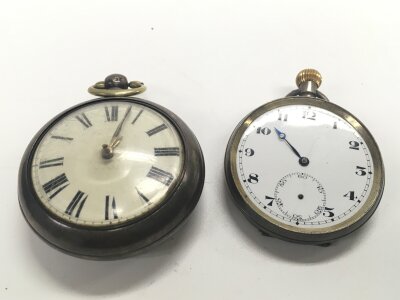 A silver pair cased watch and another silver pocket watch.