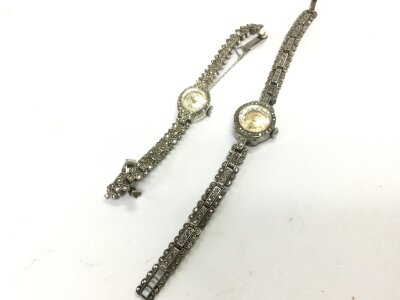 Two silver and marcasite ladies watches including Accurist, Camy. 43.5g total weight