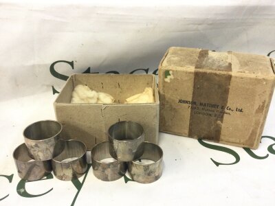 Six white metal napkin rings NO RESERVE