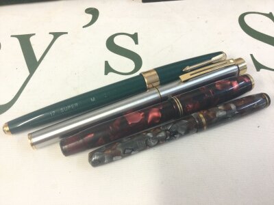 Four vintage pens Parker , Burnham , Sheaffer all with gold nibs