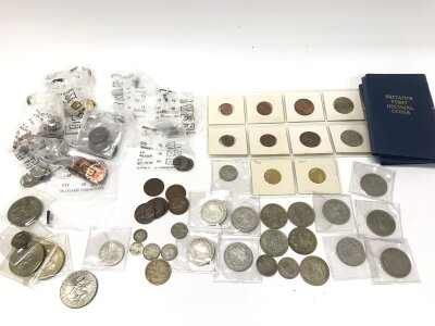 A collection of various coinage including pre 1947 silver and bronze coins.