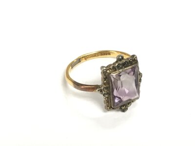 A 22ct gold and silver best amethyst and marcasite ring, approx 5.6g and approx size V.