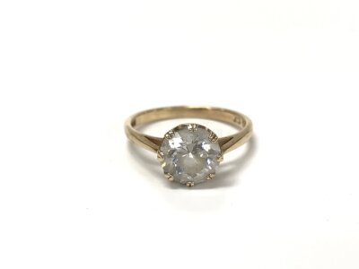 A 14ct gold ring set with CZ stone. Size N and 2.89g