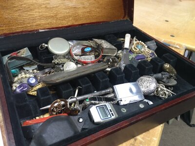 A collection of costume jewellery in a wooden box, to include silver items . No reserve