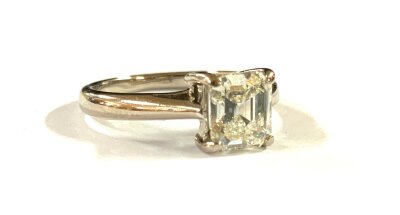 An 18ct white gold ring set with 1ct emerald cut diamond , G/H, VS2.