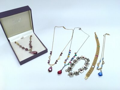 A mixed collection of gold tone Edwardian necklaces and later items