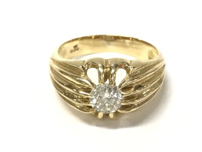 An 18ct diamond gents ring set with solitaire diamond approx 1.1ct. Size T 1/2 and 7.44g