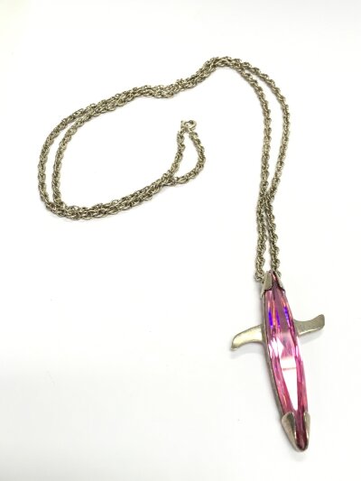 A silver pendant shark (pink glass) on sterling silver long chain. 32g total weight