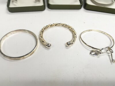 Three 925 stamped ladies bangles, approx weight 58.09grams.