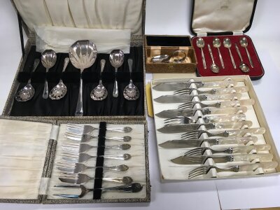 A collection of cased cutlery including silver and silver plated sets.