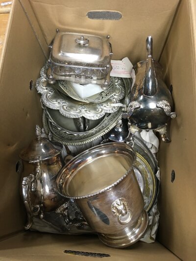 A collection of silver plated items comprising ice bucket, tea service etc.