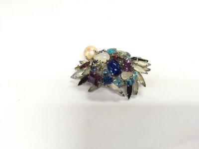 A Christian Dior multi gemstone brooch, approx width 6.5cm.