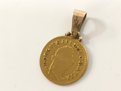 A third Guinea coin, 3.2g total weight