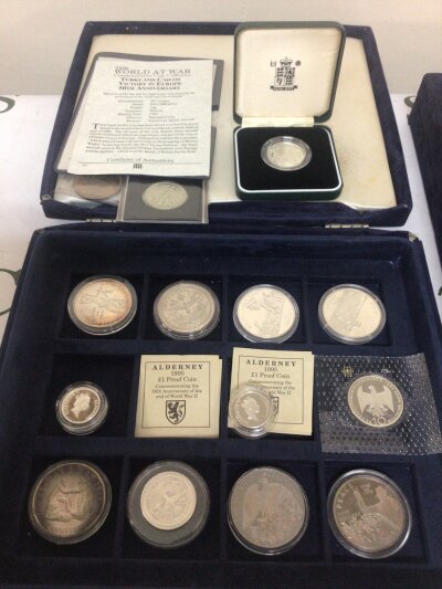 A collection of The World at War Silver proof coins both 925 and 999/1000 silver and other coins some silver