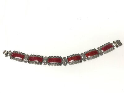 A sterling silver and enamel bracelet.