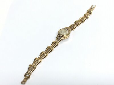 A Jaeger-LeCoultre ladies 9ct gold left hand wind watch. 24.4g