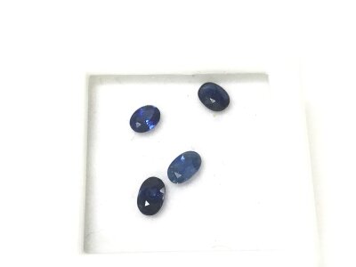 Parcel of 4 oval blue sapphires totalling approx 0.98ct.