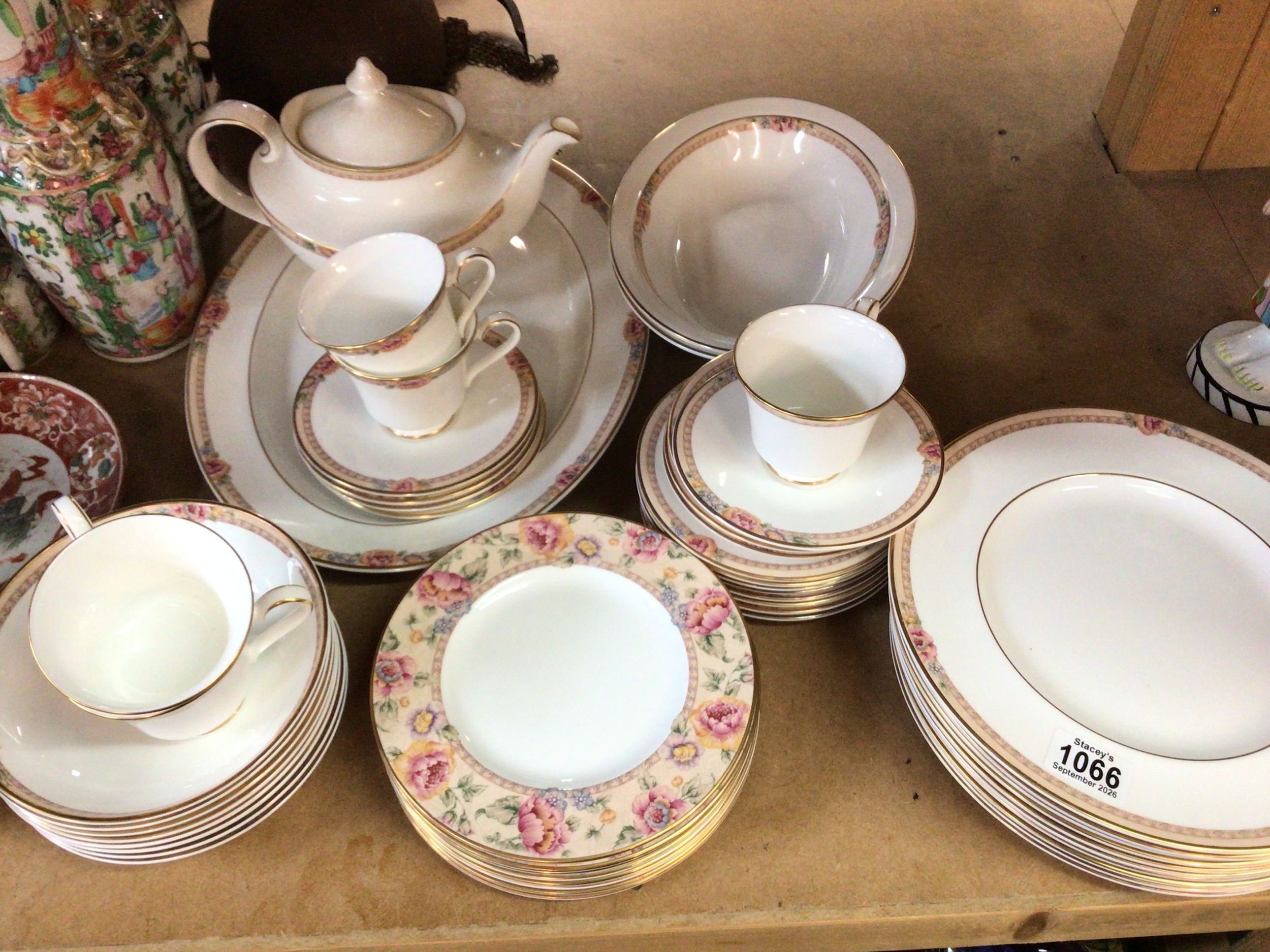  A Royal Doulton Darjeeling dinner and tea service and service. 