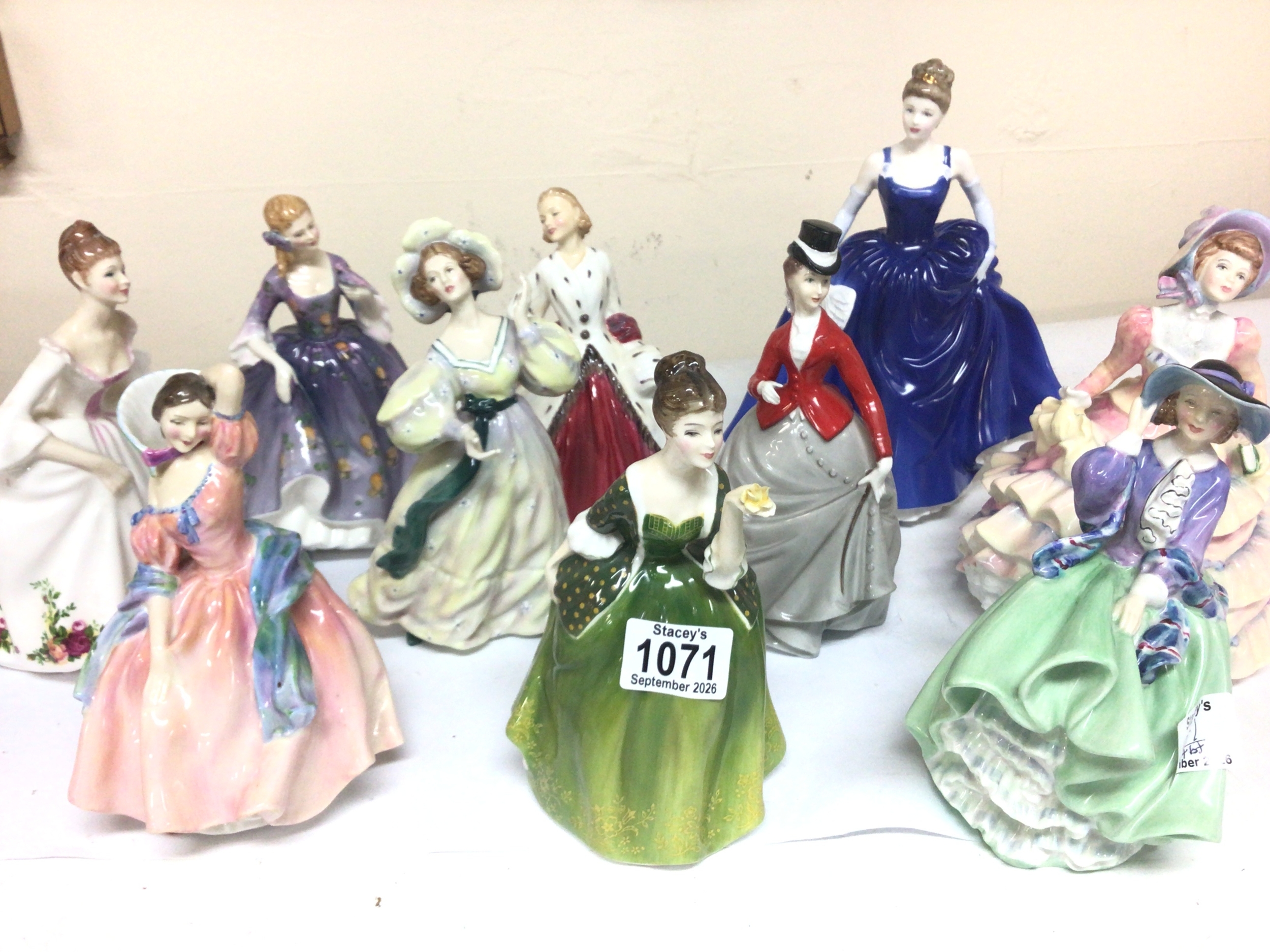 A collection of Royal Doulton figures and Worcester figure Equestrian all with no obvious damage except Maytime with a cracked base (10) 