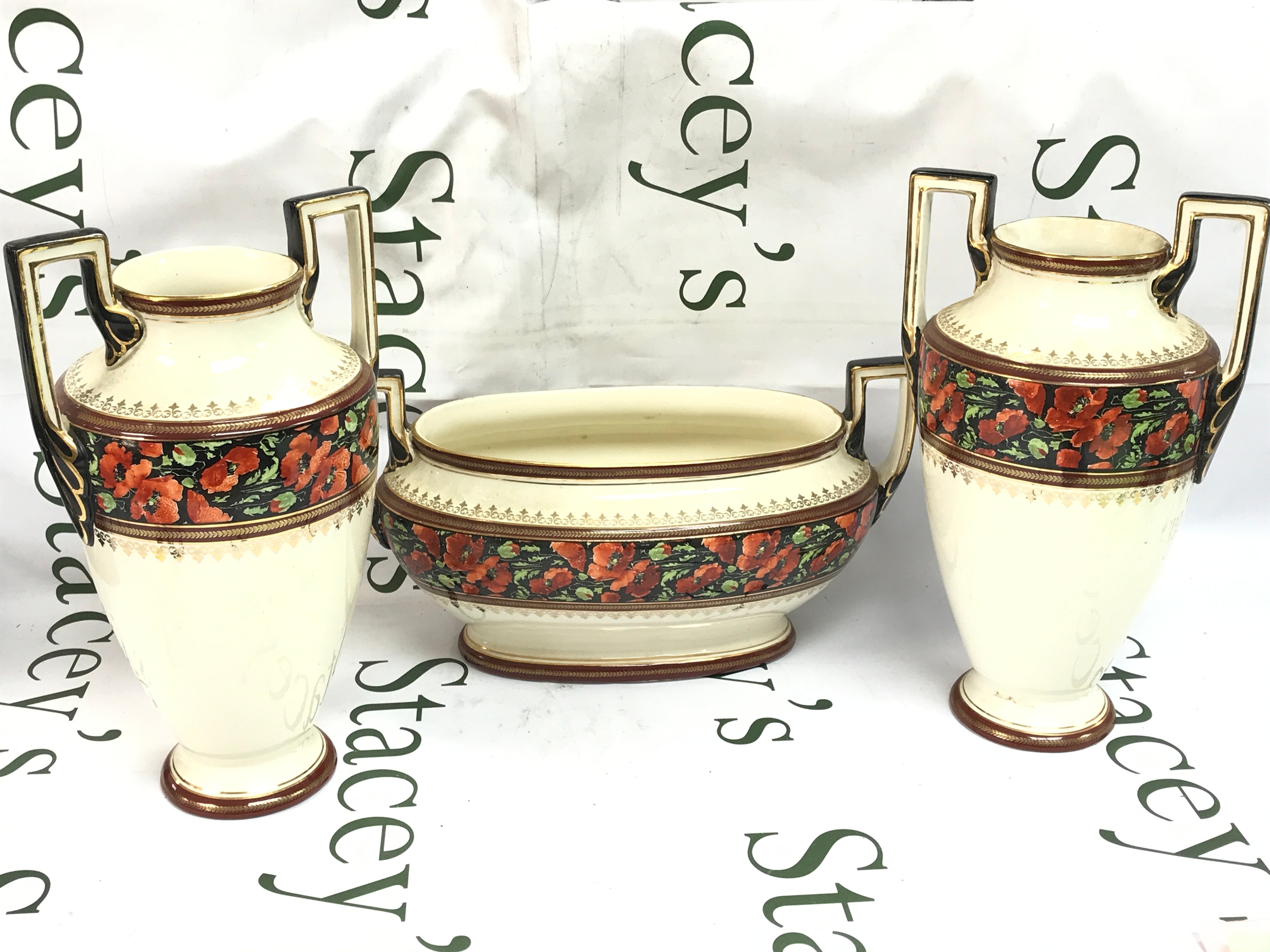 Belgian Boch F La Louviere urn 33cm wide and vases 29cm tall 